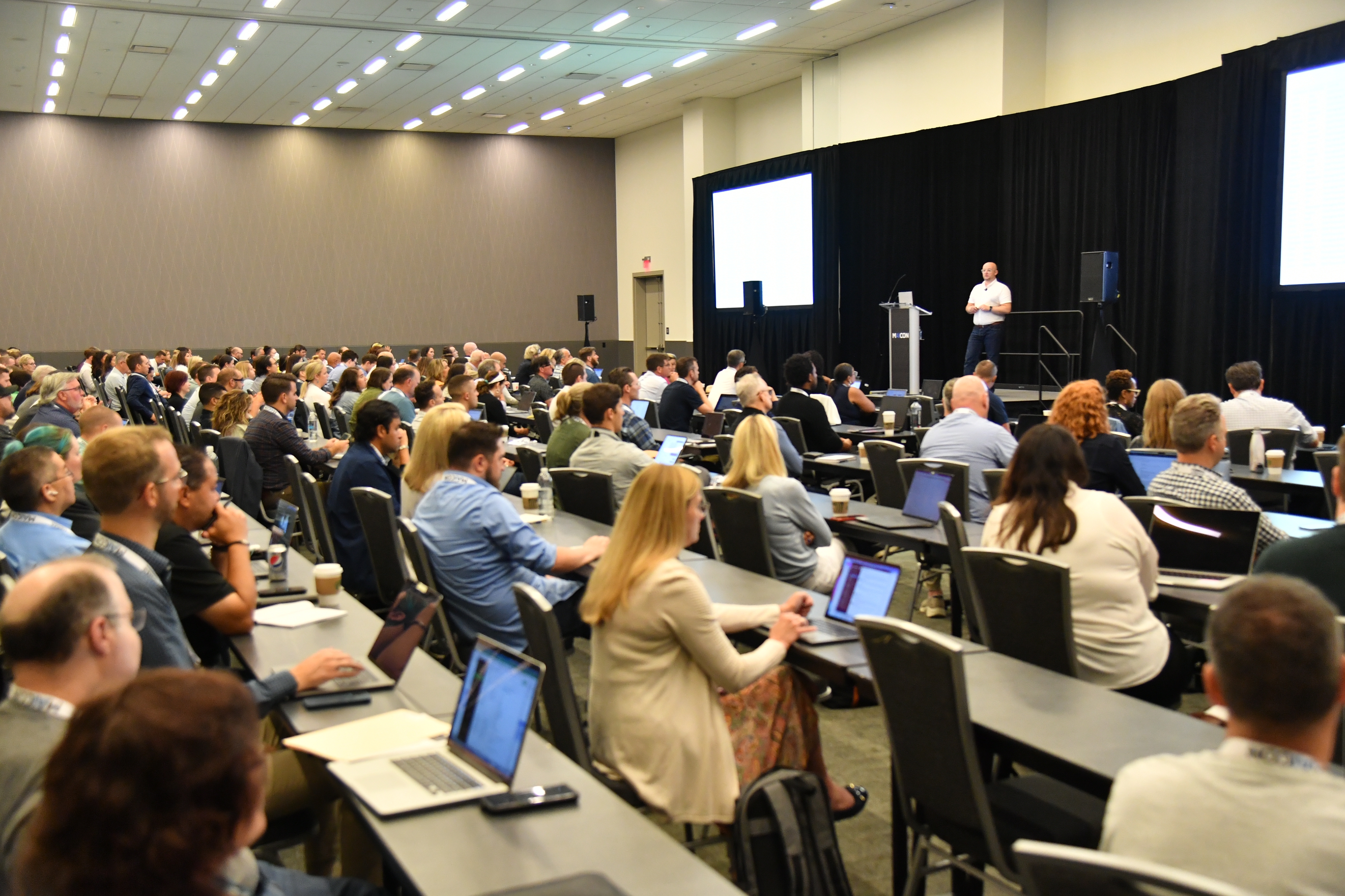 Martin Broadhurst delivering AI keynote to 300 person audience